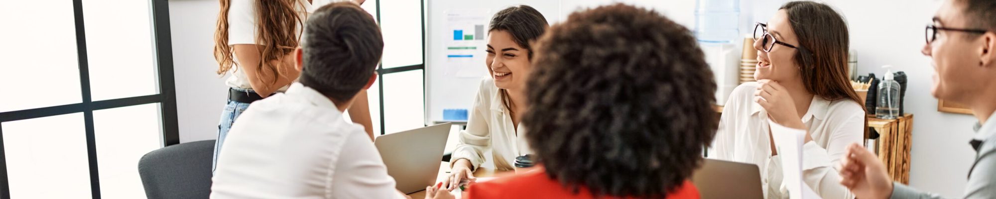 Group of business workers listening boss conference during meeting at the office.